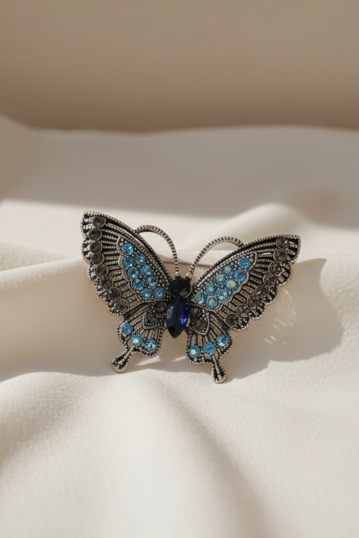 Vintage Butterfly Crystal Brooch – Blue Sapphire & Marcasite