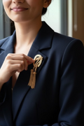 Gold Tassel Brooch